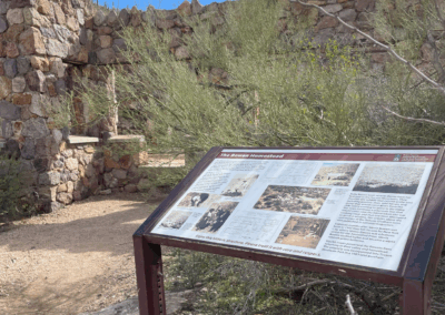 Image shows a sign near the Bowen Stone House.