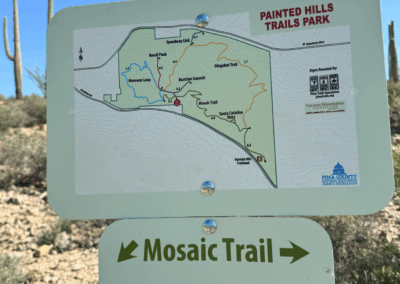 Image of a sign directing hikers to a climb from the Mosaic Trail to the Bactrian Summit.